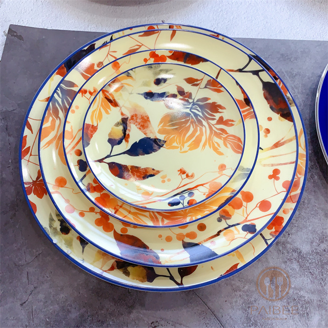Countryside autumn pick with berry leaves and old warm yellow background vintage bone china plate