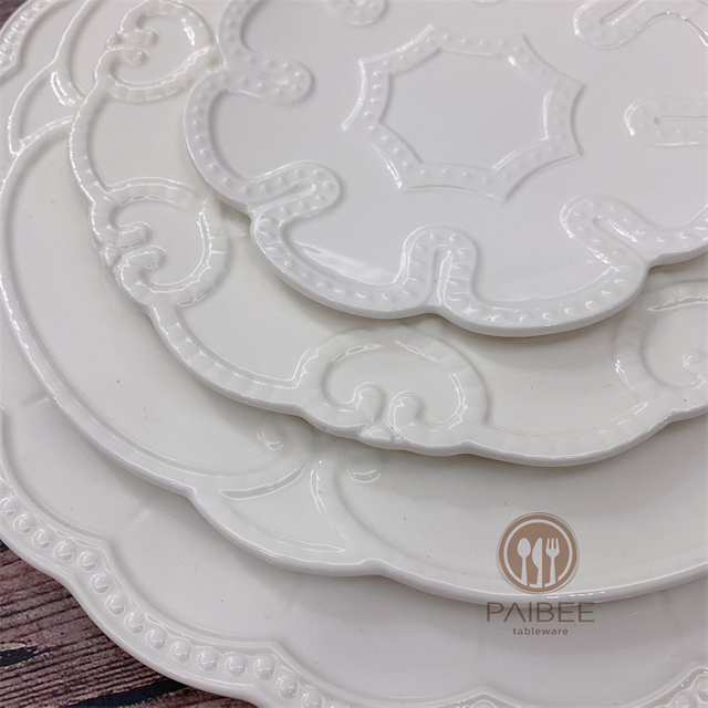 Embossed white bone china plate ceramic flower plate factory