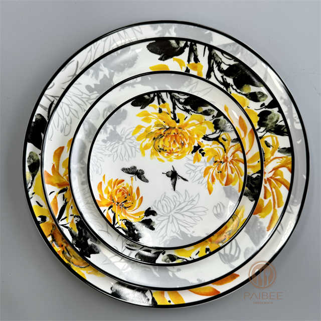 The bright yellow glaze reproduces the overlapping petals of golden chrysanthemum, with black outline, showing exquisite