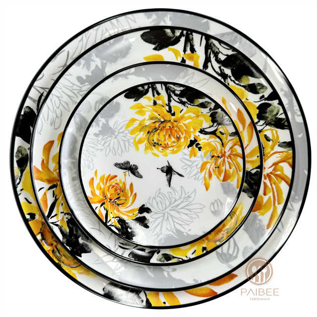 The bright yellow glaze reproduces the overlapping petals of golden chrysanthemum, with black outline, showing exquisite